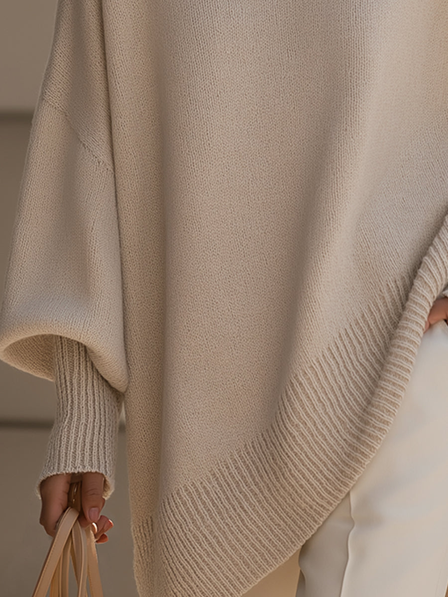 A woman wearing a soft crew neck sweater with jeans for a warm, easy everyday look.