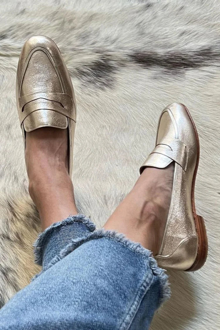 A woman wearing relaxed casual loafers on an easy day out.