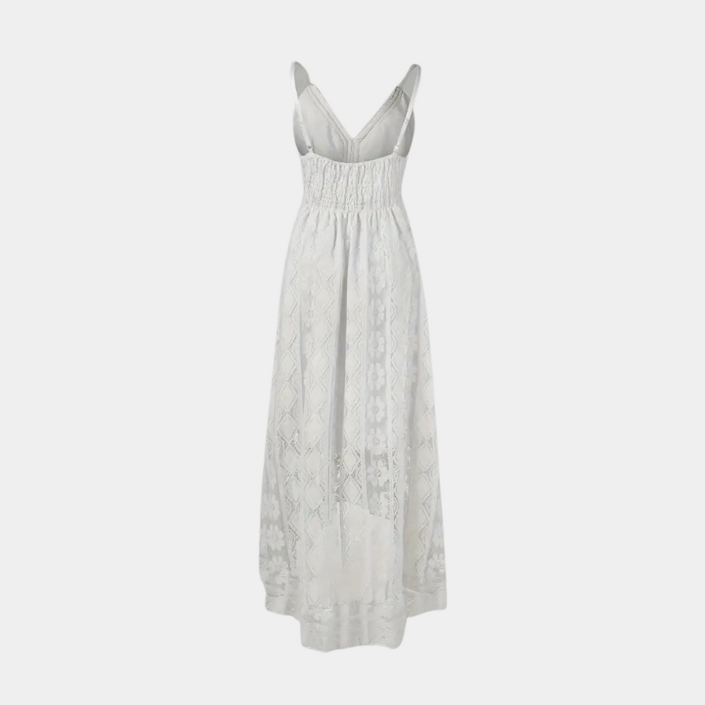 Woman wearing the Jill™ elegant boho midi dress with intricate detailing and a V-neckline at a summer garden party.