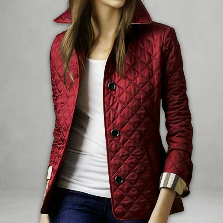 A woman wearing an fall jacket over a top, layered for a crisp day in town.