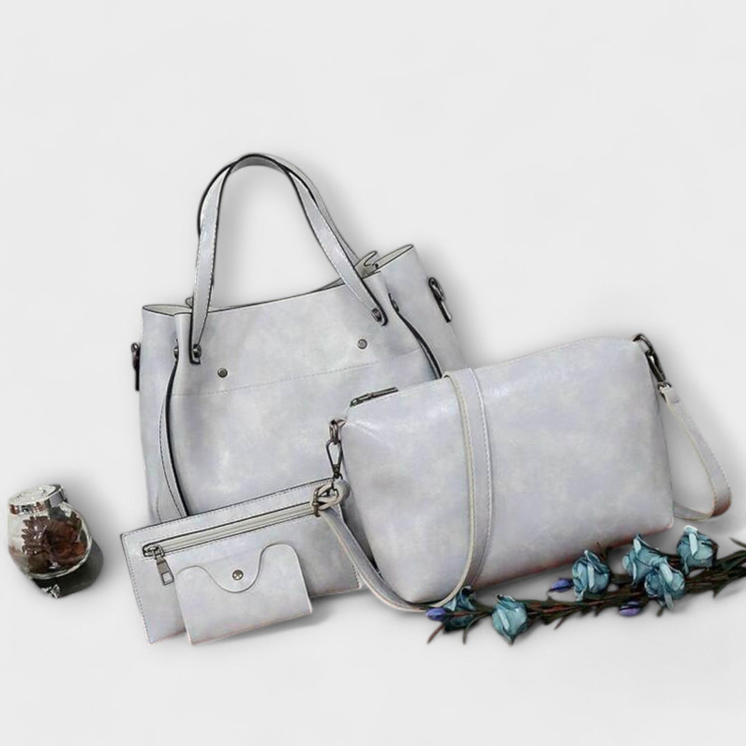 A woman carrying a coordinated vintage-style four-piece bag set on a day out