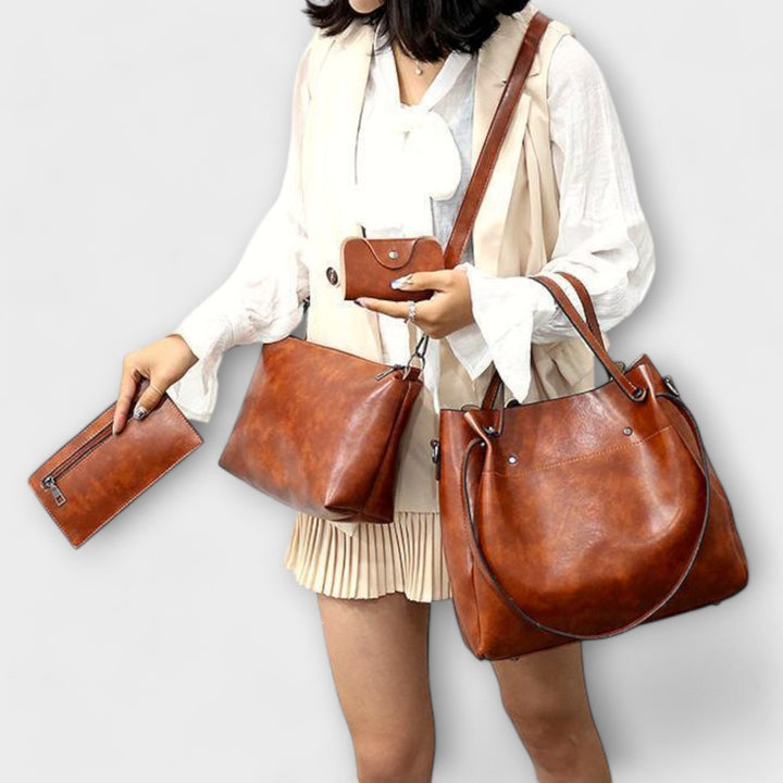 A woman carrying a coordinated vintage-style four-piece bag set on a day out