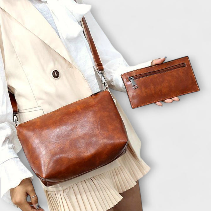 A woman carrying a coordinated vintage-style four-piece bag set on a day out