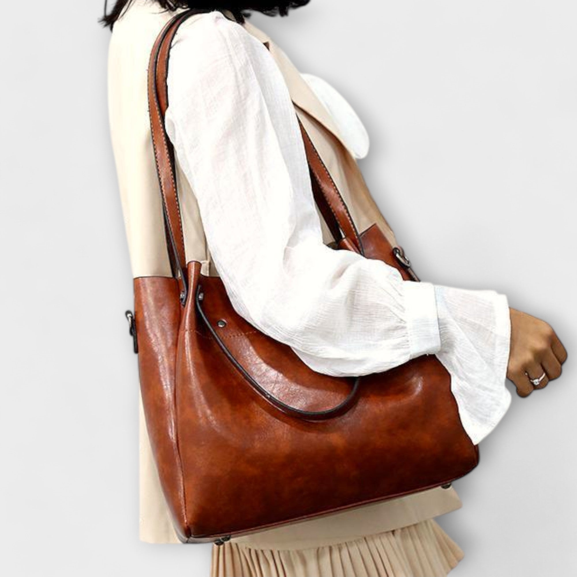 A woman carrying a coordinated vintage-style four-piece bag set on a day out