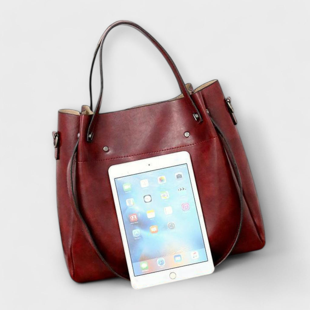 A woman carrying a coordinated vintage-style four-piece bag set on a day out