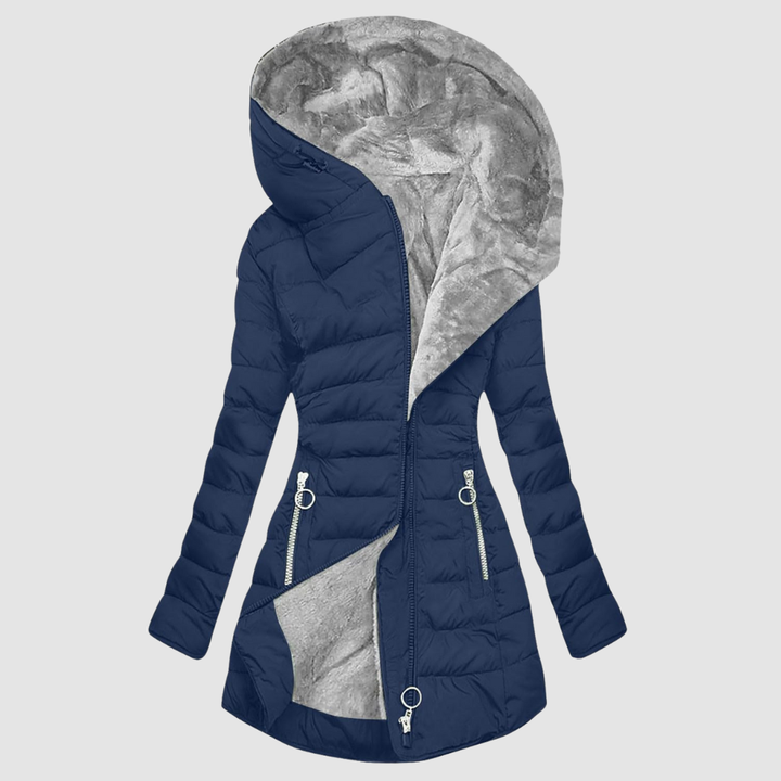 A sage green quilted winter coat with a deep, soft-lined hood and an angled zip front.