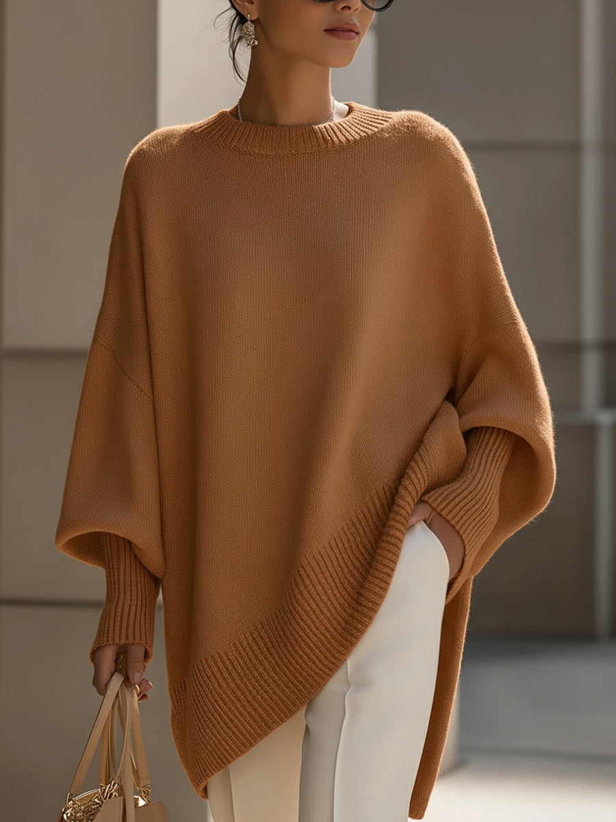 A woman wearing a soft crew neck sweater with jeans for a warm, easy everyday look.