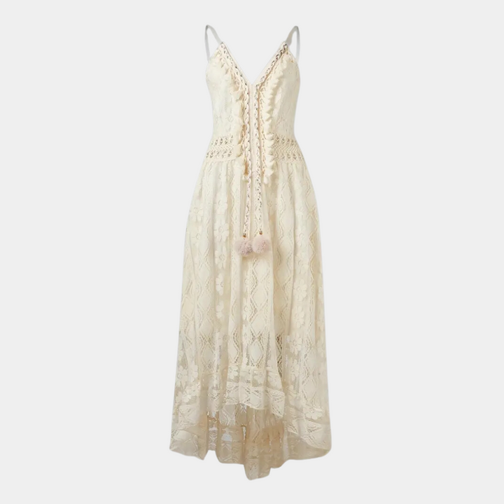 Woman wearing the Jill™ elegant boho midi dress with intricate detailing and a V-neckline at a summer garden party.