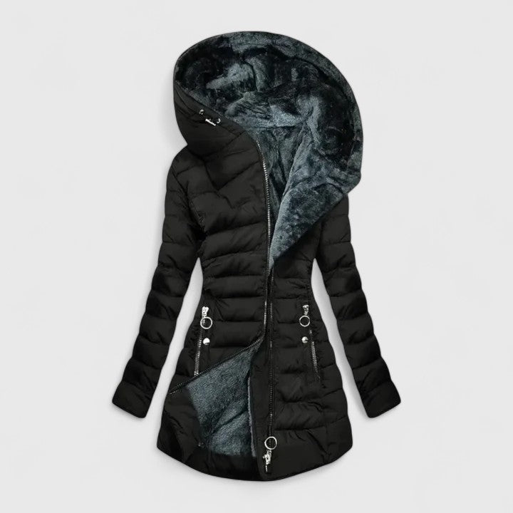 A sage green quilted winter coat with a deep, soft-lined hood and an angled zip front.