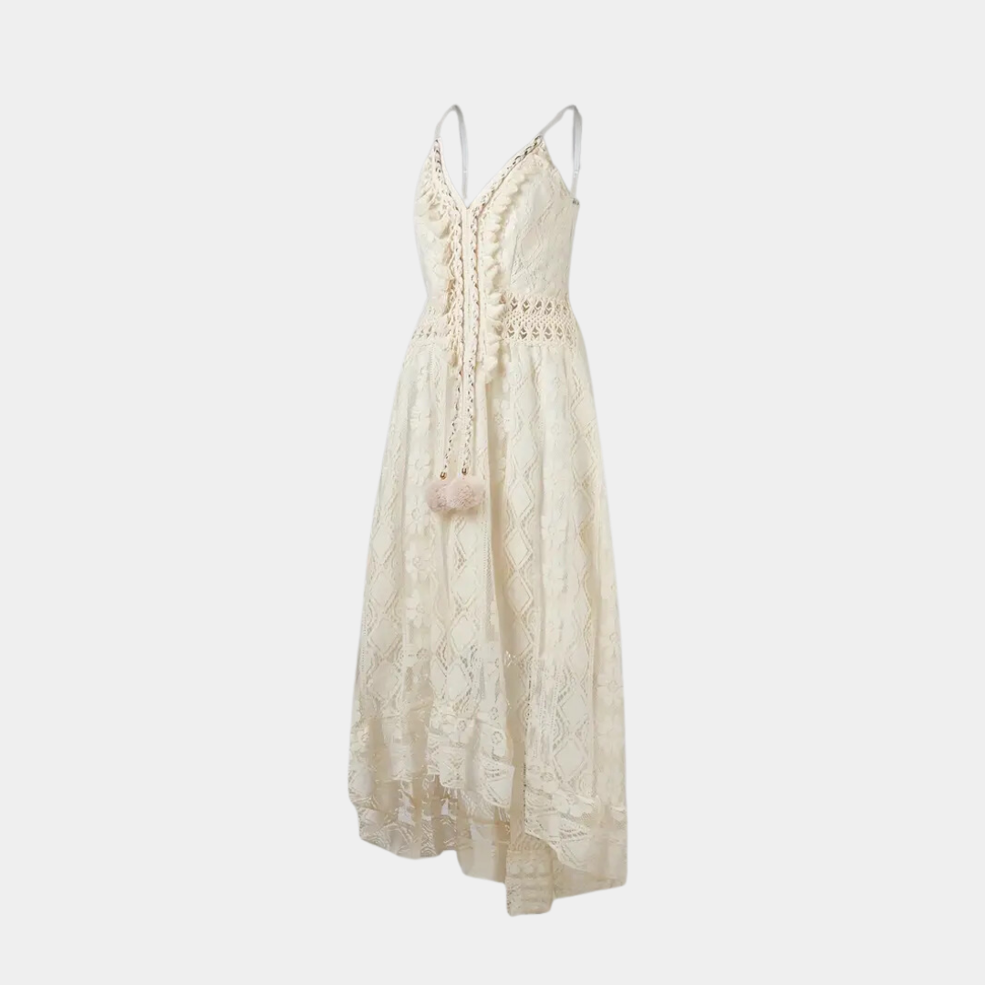 Woman wearing the Jill™ elegant boho midi dress with intricate detailing and a V-neckline at a summer garden party.