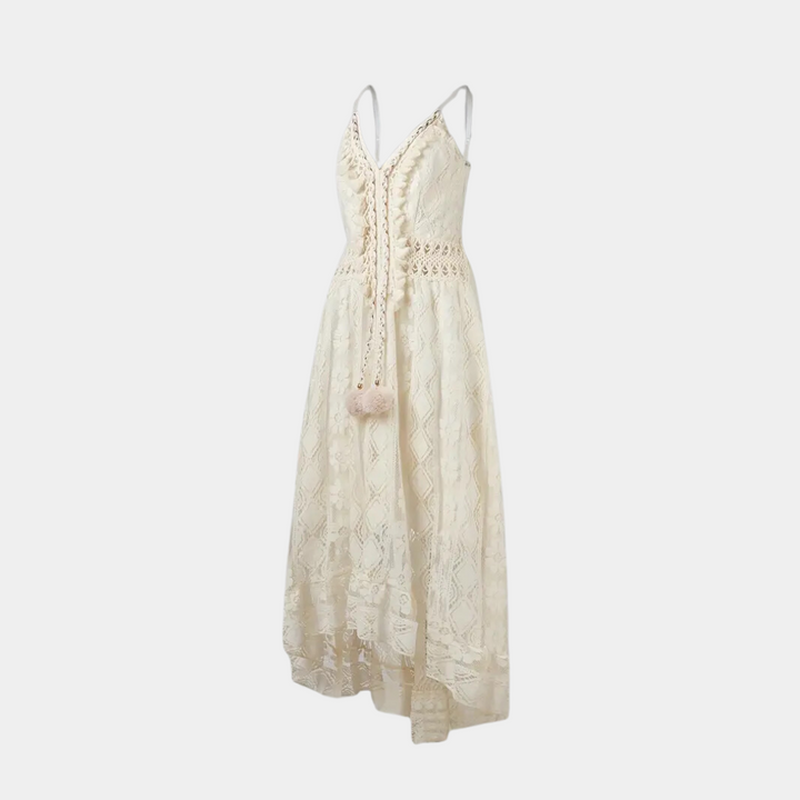 Woman wearing the Jill™ elegant boho midi dress with intricate detailing and a V-neckline at a summer garden party.