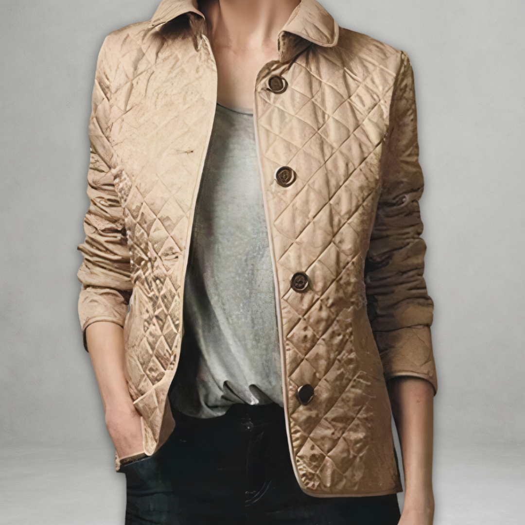 A woman wearing an fall jacket over a top, layered for a crisp day in town.