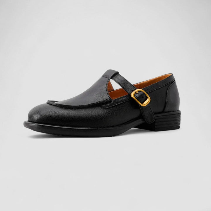 A woman in black round-toe Mary Jane shoes, comfortable and classic at the office.
