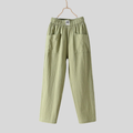 Relaxed tapered pants with roomy front patch pockets and an elastic waist.