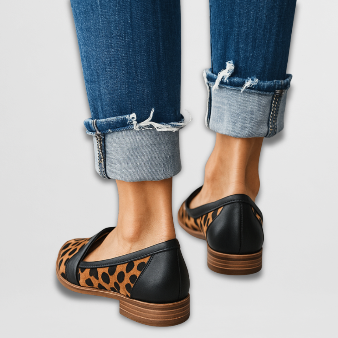 A woman wearing soft-touch loafers on a relaxed day out.