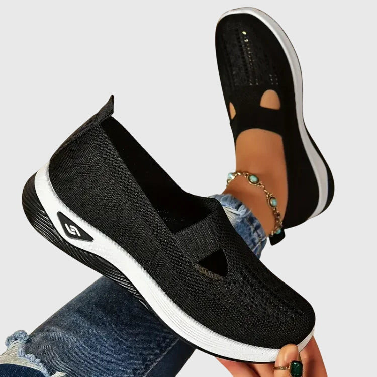 A woman out for a long walk in supportive orthopaedic walking shoes.