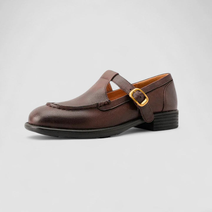 A woman in black round-toe Mary Jane shoes, comfortable and classic at the office.