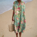 A woman in a light, flowing summer dress relaxing outdoors on a warm, bright day.
