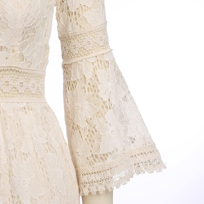 Woman twirling in the Genevieve romantic boho maxi dress with delicate floral detailing and a ruffled hem.