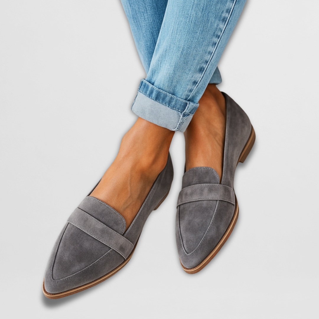 A woman wearing soft-touch loafers on a relaxed day out.