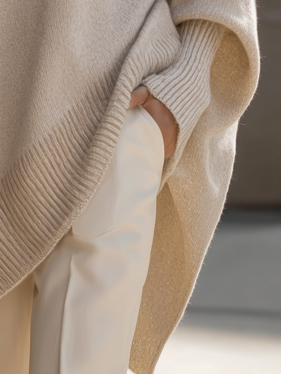 A woman wearing a soft crew neck sweater with jeans for a warm, easy everyday look.