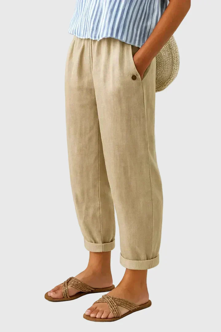 A woman wearing chic comfy pants with a modern relaxed cut and flattering silhouette.