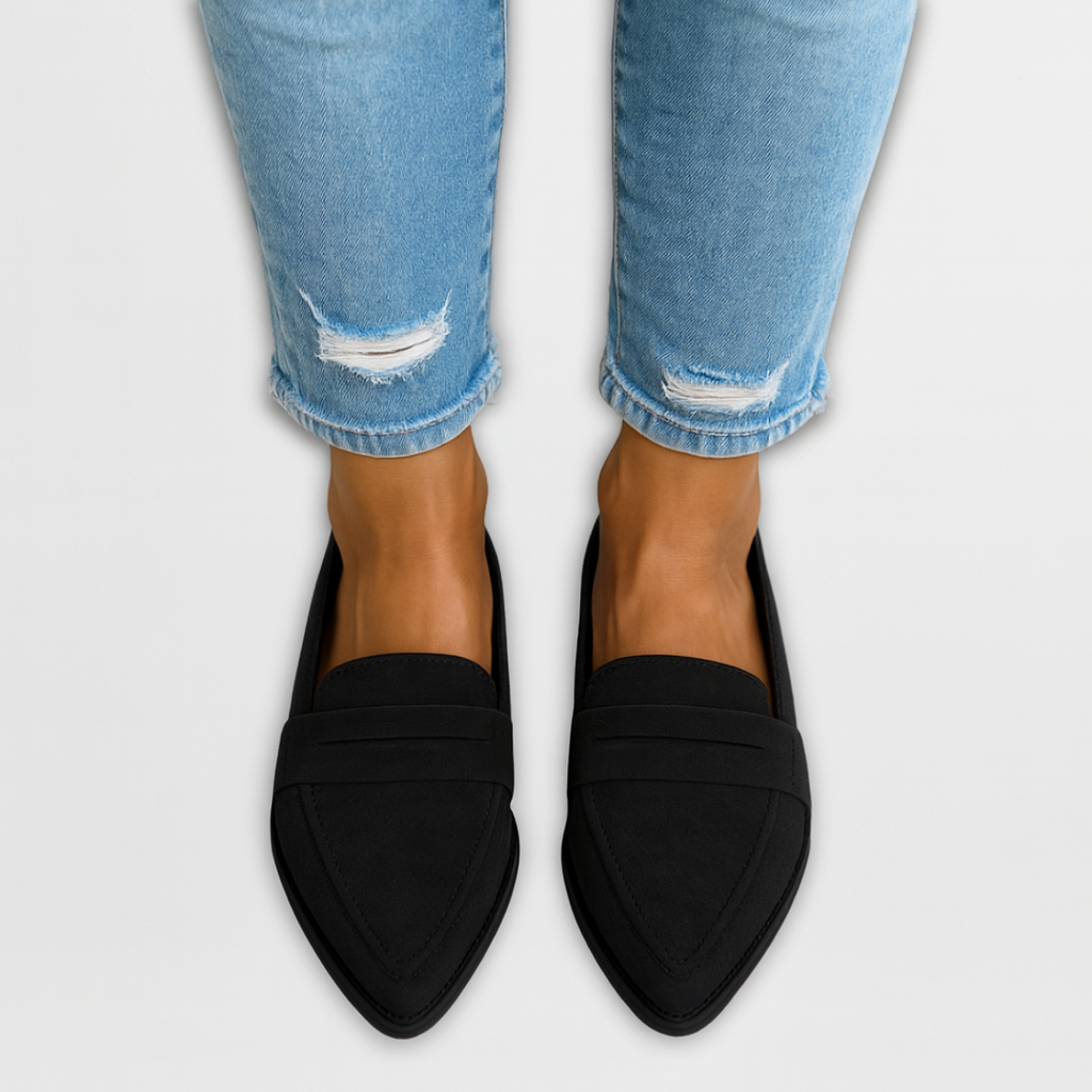 A woman wearing soft-touch loafers on a relaxed day out.