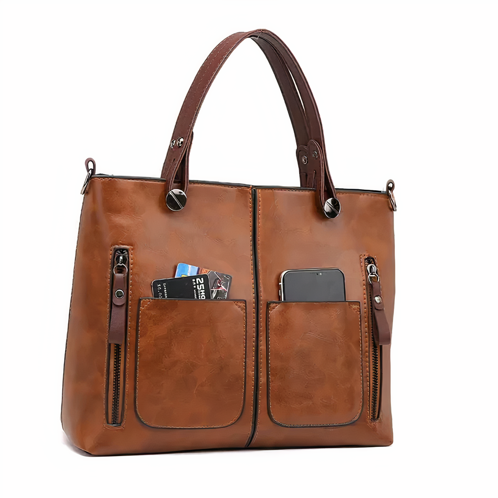 A woman holding a versatile classic handbag with a rich finish by her side