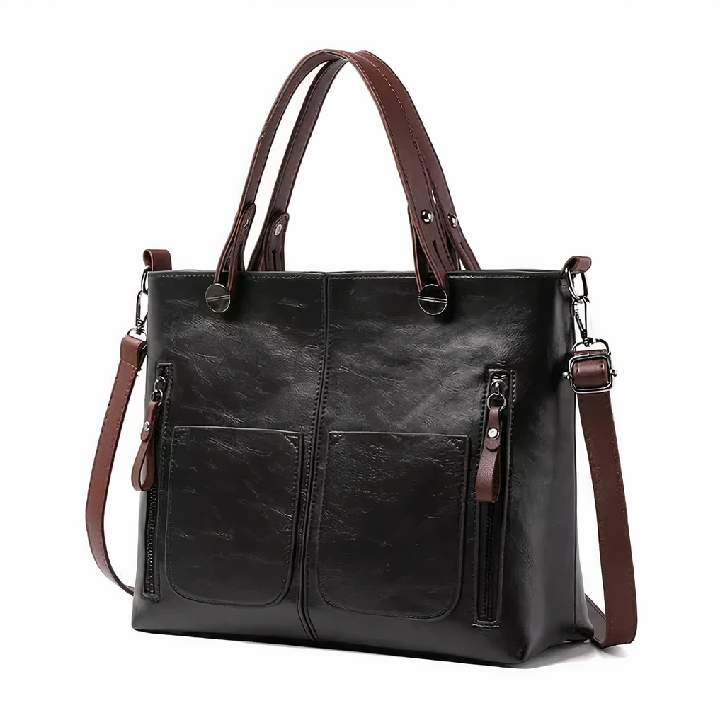 A woman holding a versatile classic handbag with a rich finish by her side