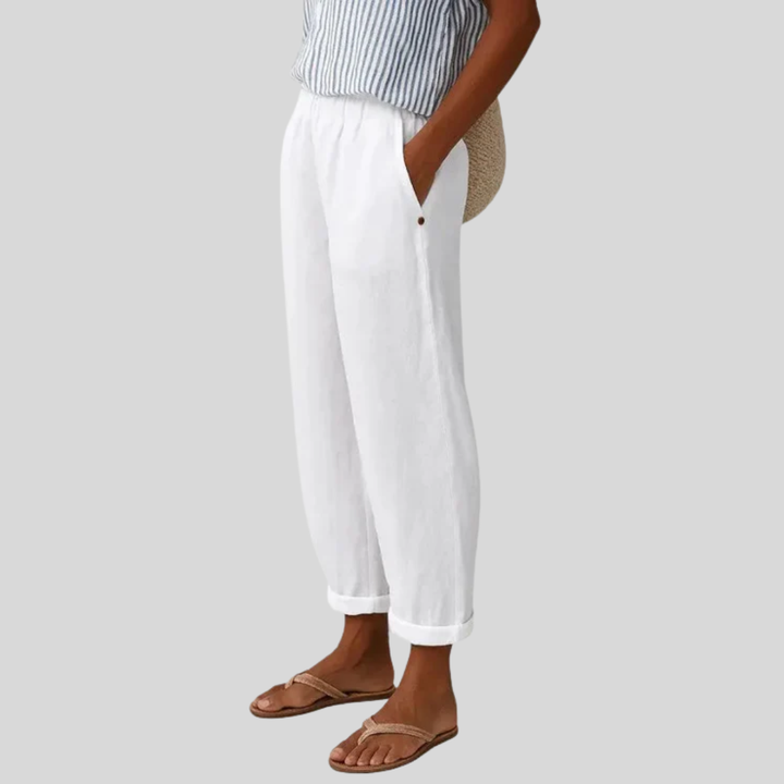 A woman wearing chic comfy pants with a modern relaxed cut and flattering silhouette.