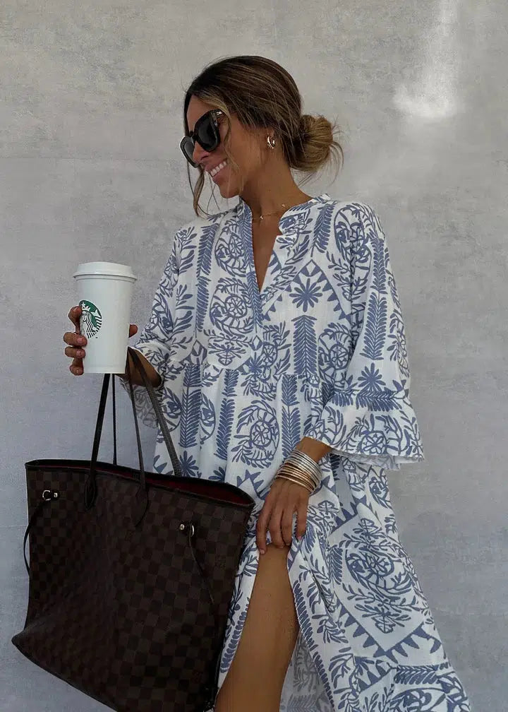 Woman wearing the Elaine button-front boho tunic dress, relaxed on a casual day out.