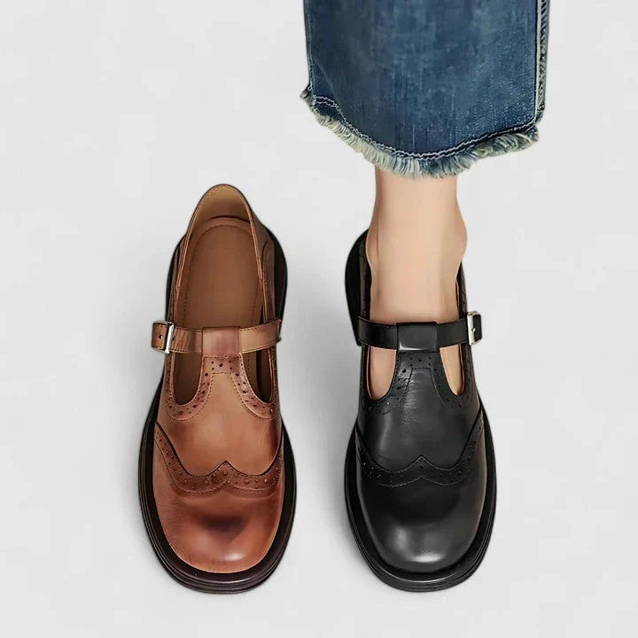 A woman wearing classic strap Mary Jane shoes on an elegant day out.