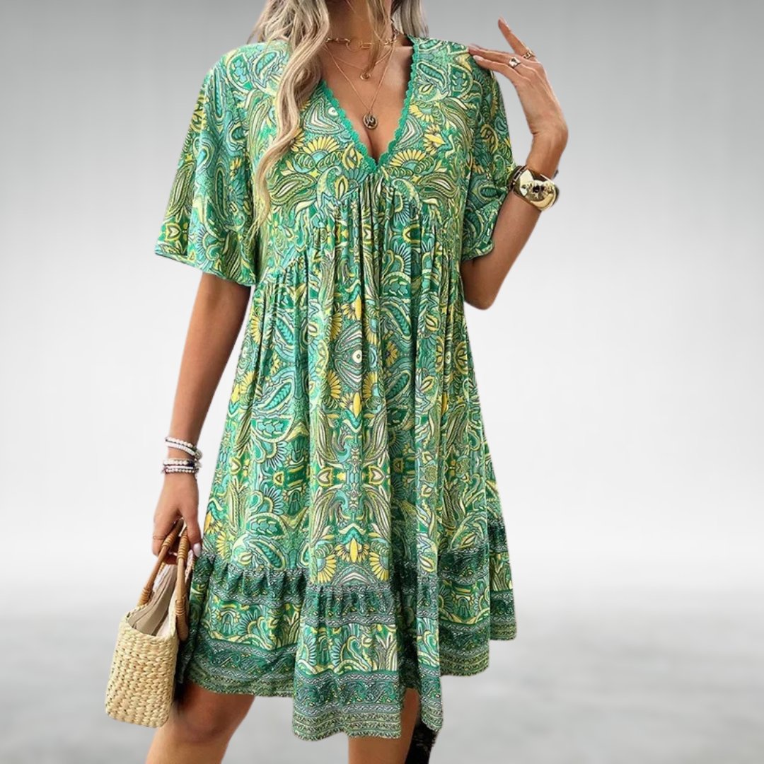 Woman in a patterned boho swing dress with a V-neckline, moving with an easy sway.