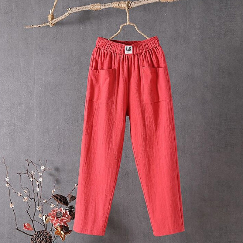 Relaxed tapered pants with roomy front patch pockets and an elastic waist.