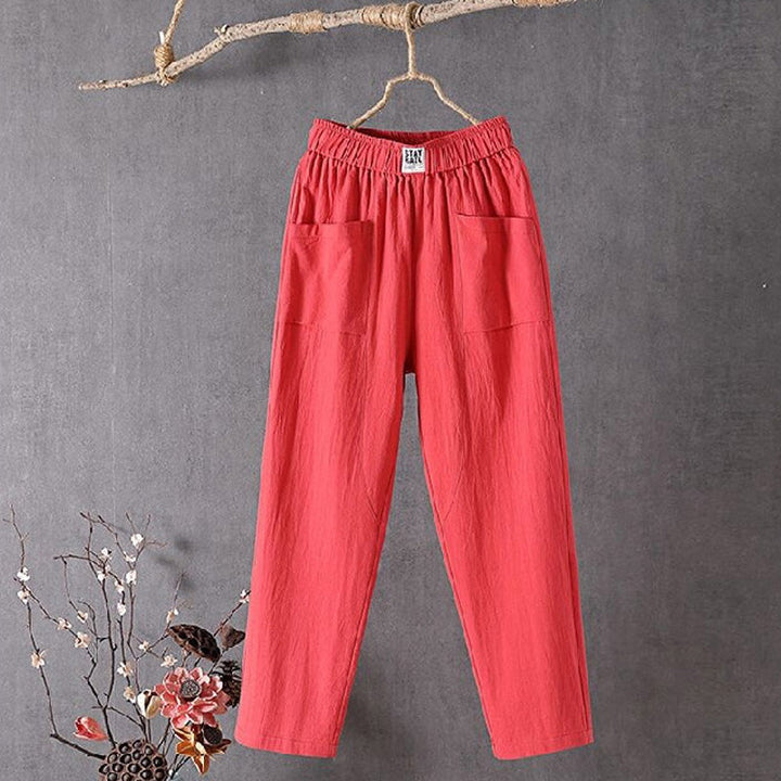 Relaxed tapered pants with roomy front patch pockets and an elastic waist.