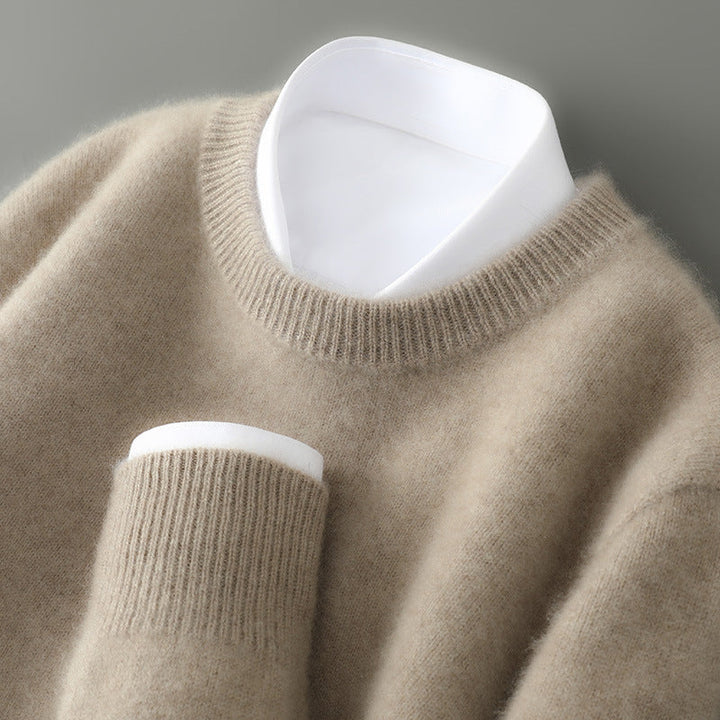 A woman wearing a soft warm sweater layered over a shirt on a cold day.