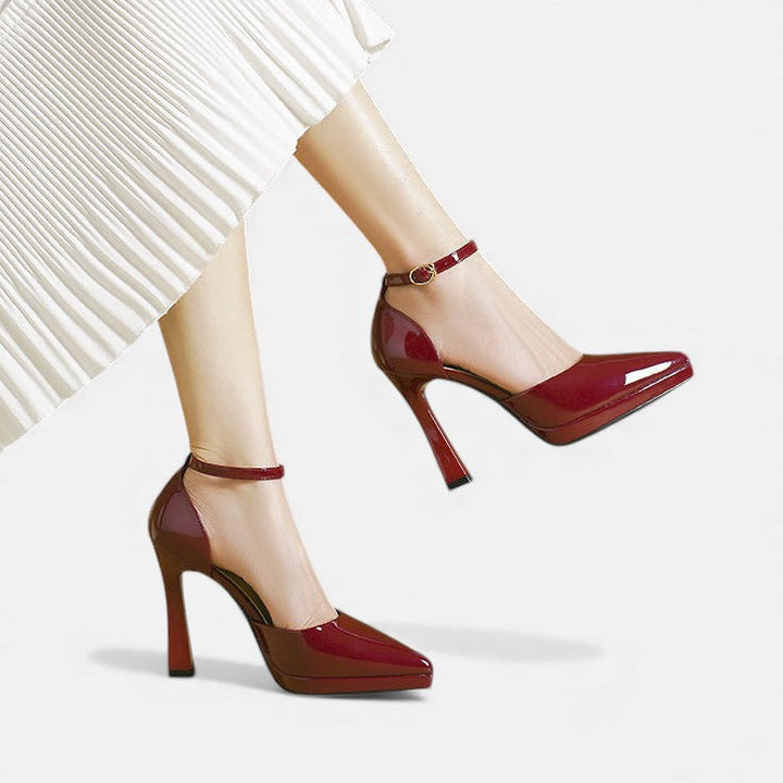 A woman in pointed ankle-strap pumps with a block heel, dressed for a day-to-night occasion.