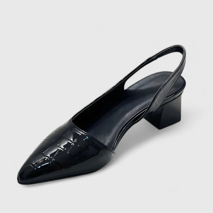 A glossy black croc-effect pointed-toe slingback with a low block heel, shown at an angle.