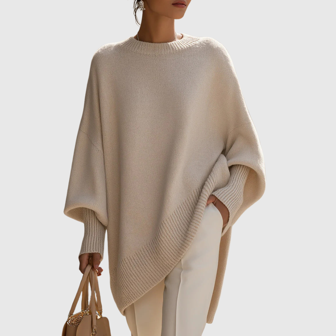 A woman wearing a soft crew neck sweater with jeans for a warm, easy everyday look.