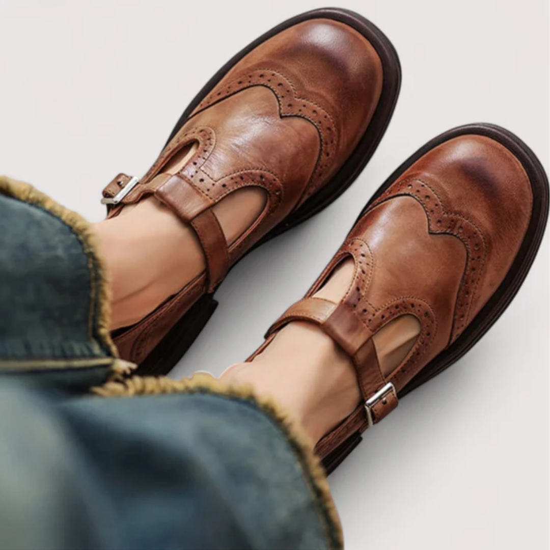 A woman wearing classic strap Mary Jane shoes on an elegant day out.