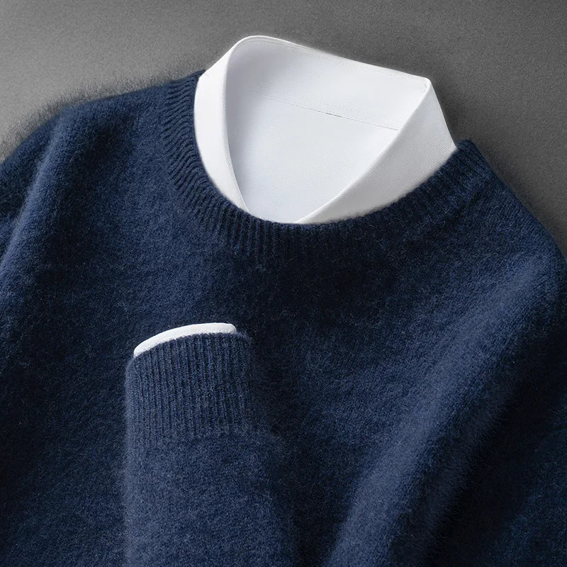 A woman wearing a soft warm sweater layered over a shirt on a cold day.
