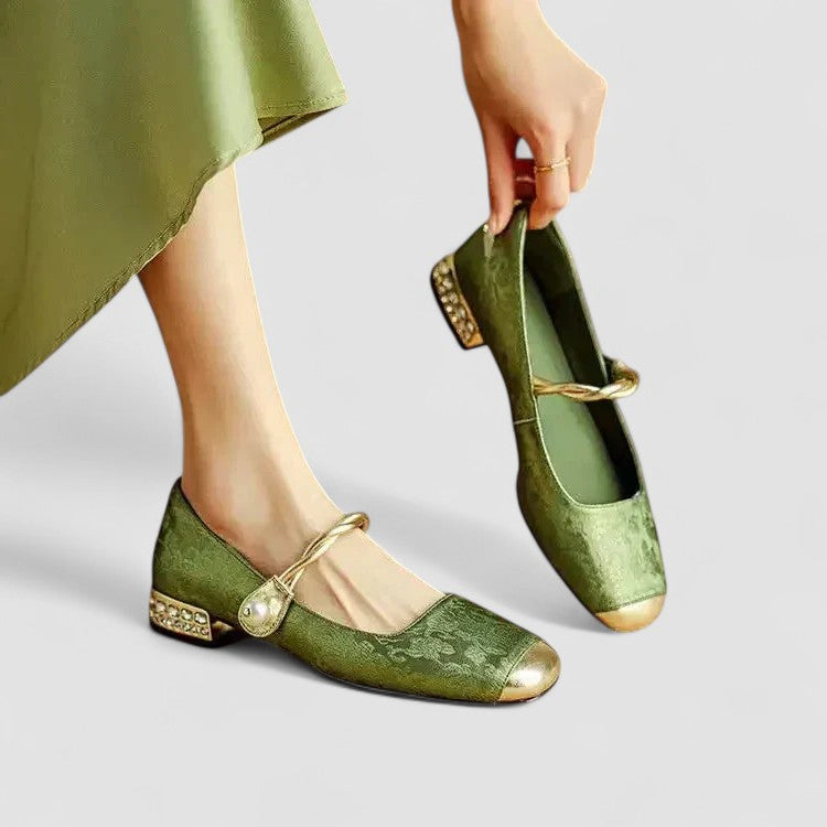 A woman wearing embellished green Mary Jane flats at a special occasion.