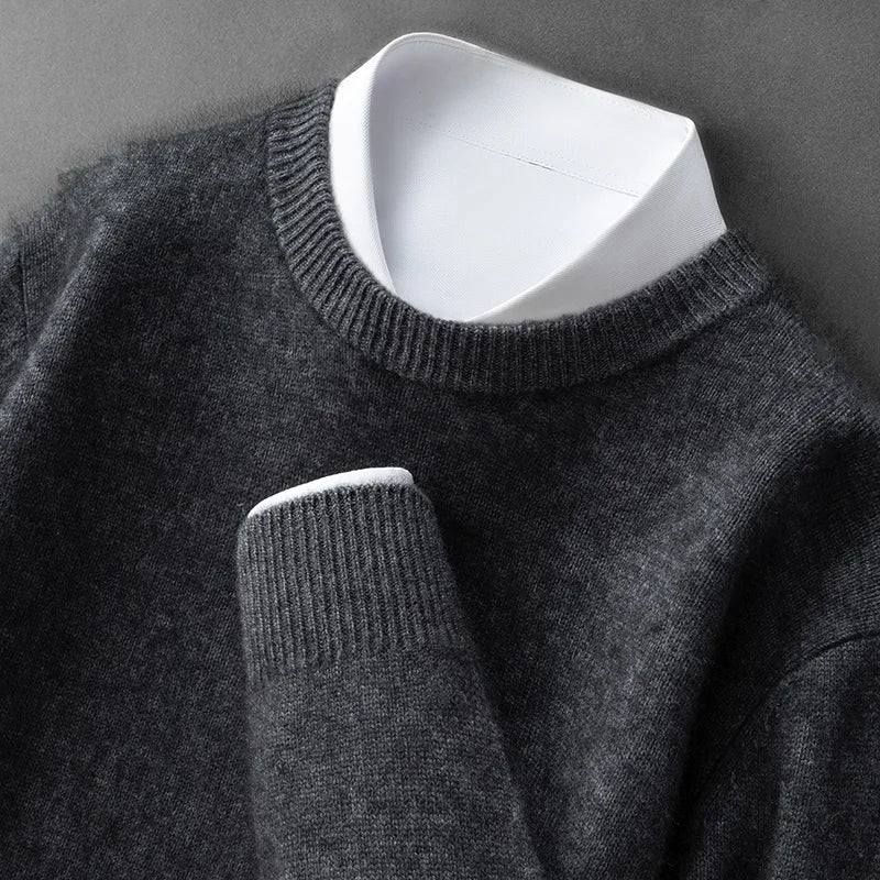 A woman wearing a soft warm sweater layered over a shirt on a cold day.