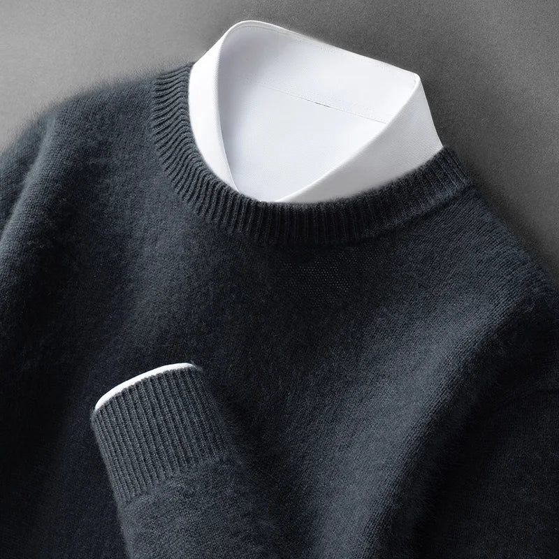 A woman wearing a soft warm sweater layered over a shirt on a cold day.