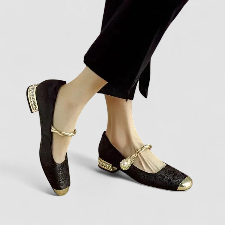 A woman wearing embellished green Mary Jane flats at a special occasion.