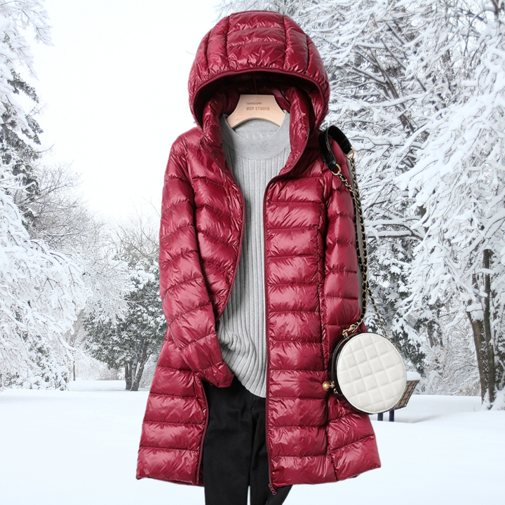 A rail of ultra-light padded hooded coats in pink, red, khaki and black, knee-skimming in length.