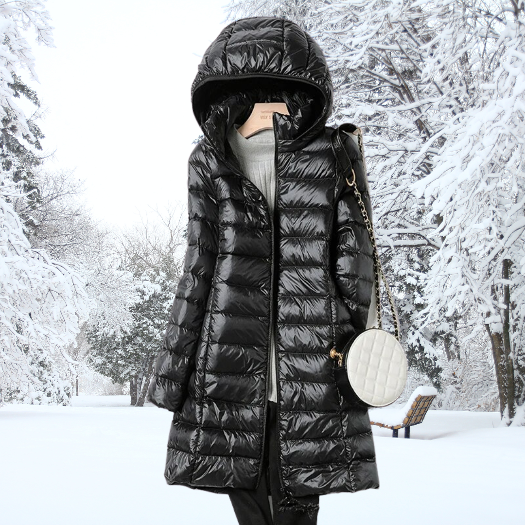 A rail of ultra-light padded hooded coats in pink, red, khaki and black, knee-skimming in length.