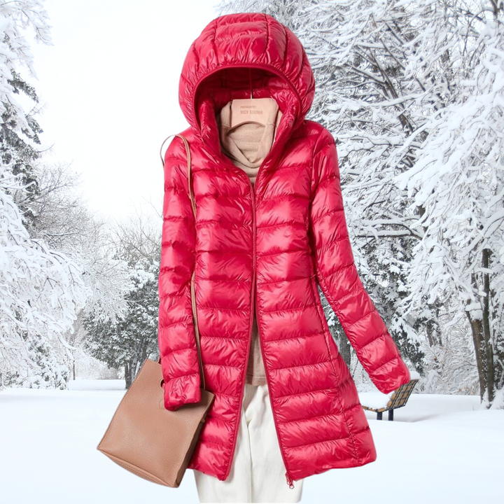 A rail of ultra-light padded hooded coats in pink, red, khaki and black, knee-skimming in length.