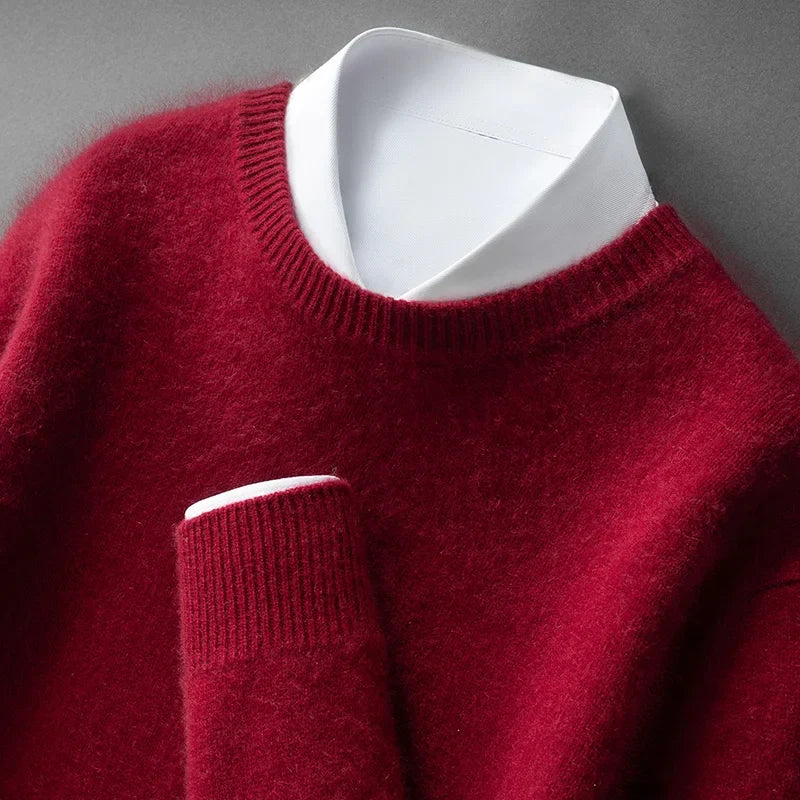 A woman wearing a soft warm sweater layered over a shirt on a cold day.