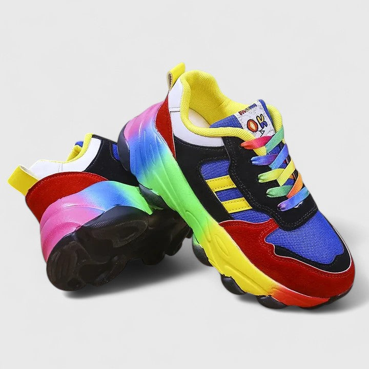 A woman wearing colourful cushioned orthopaedic lace-up shoes